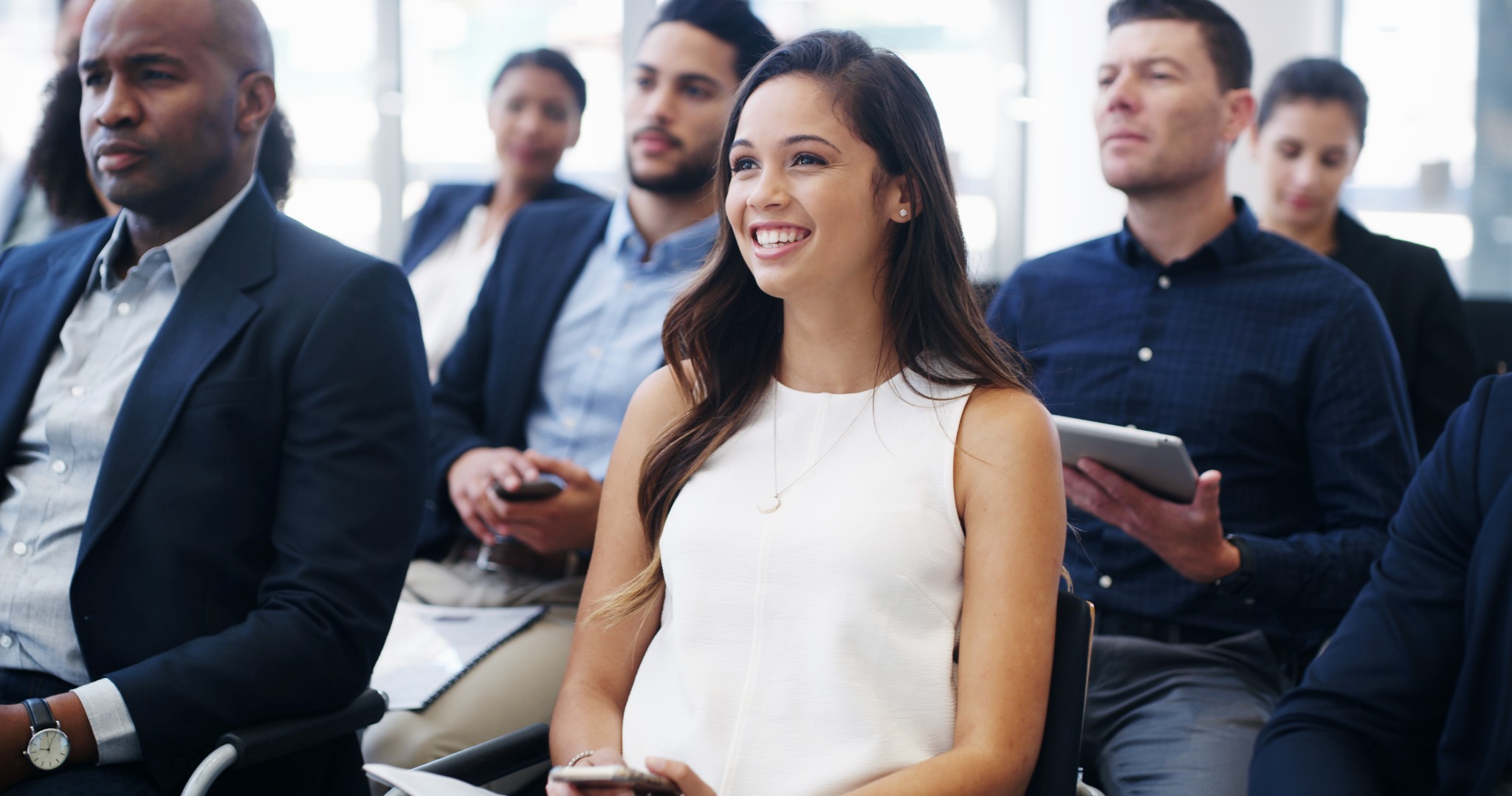 Business professionals taking part in a learning session