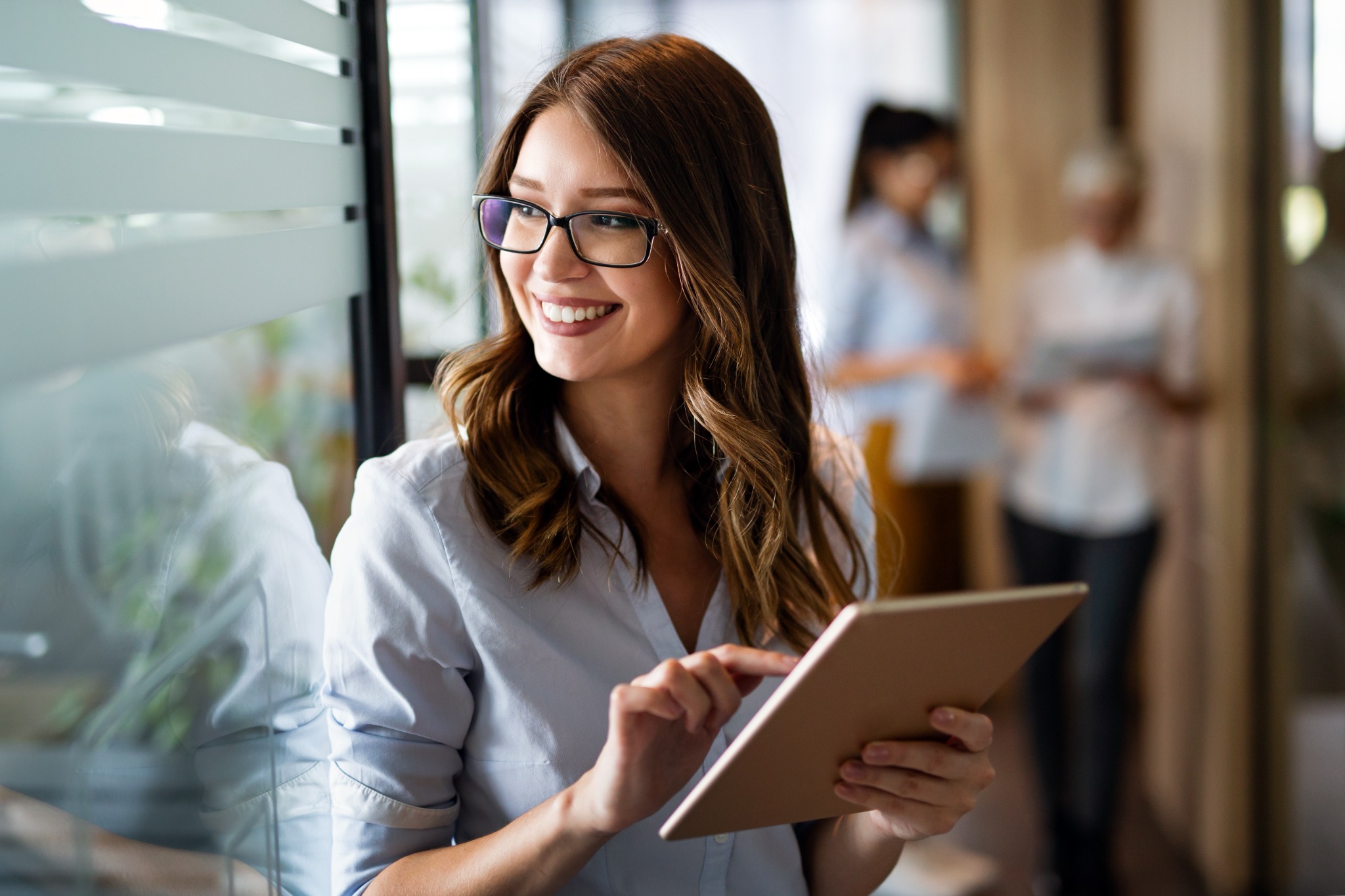 Business professional learning with a tablet